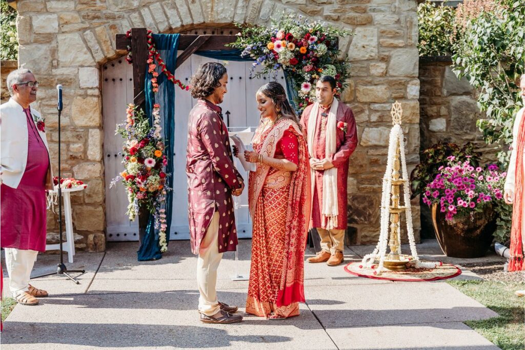 A couple saying their vows at  destination weddings in Thailand
