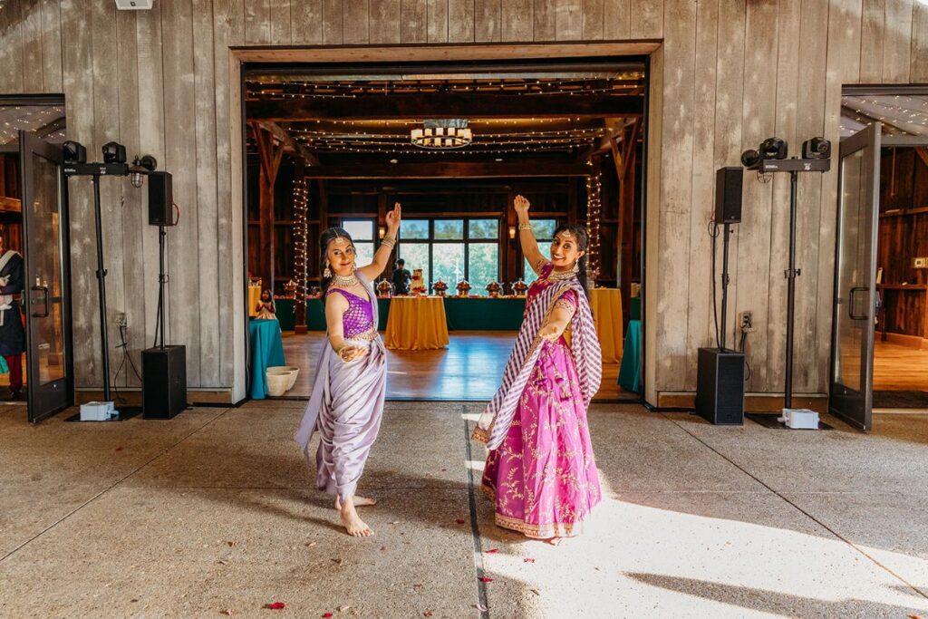 women dancing and inviting people in 